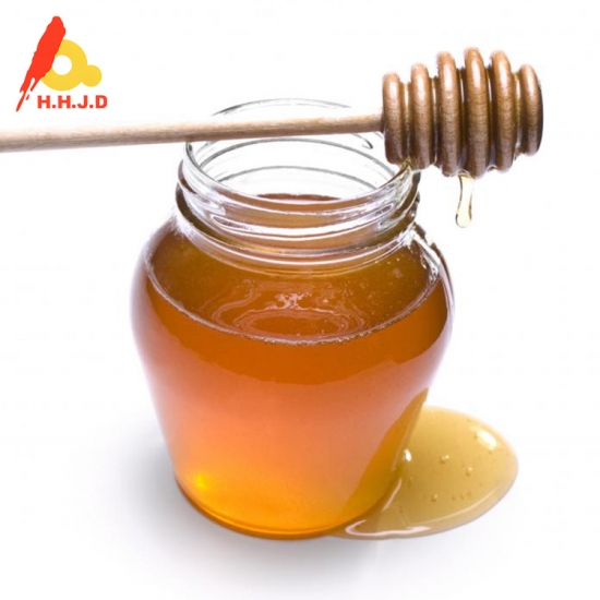 A granel orgánico natural abeja miel cruda color ámbar claro 